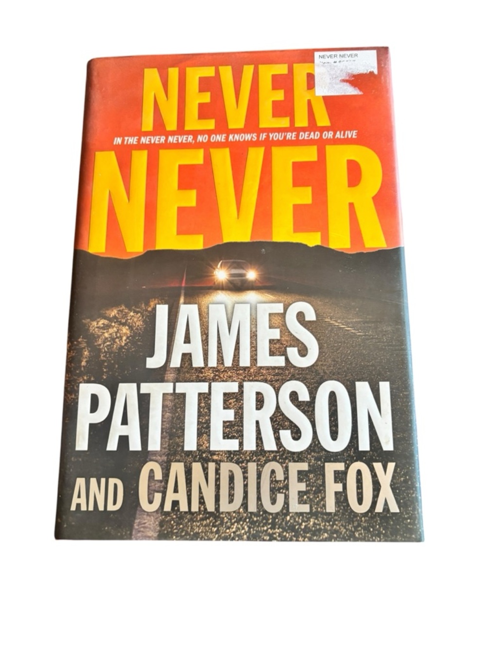 Never Never by James Patterson & Candice Fox Hardcover Book